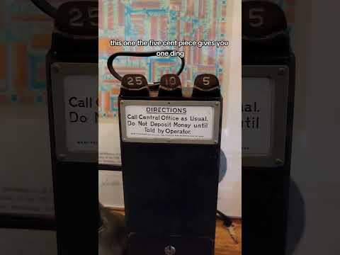 Antique Pay phone, over 100 years old.