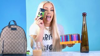 Download the video "10 Things Tana Mongeau Can’t Live Without | Bootleg GQ"