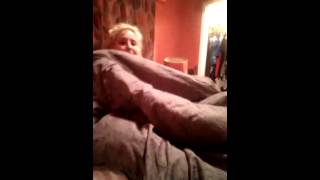 Audrey smoking under the blanket