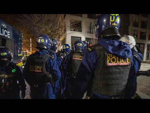 Police raid: Officers confronted with knives as they raid suspected fraudsters in national crackdown