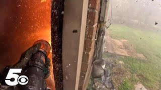 Firefighter&#39;s bodycam shows battling housefire first-hand