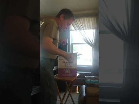 Howie's opening his gift