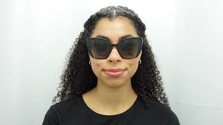 Woman model wearing Dolce and Gabbana DG6138 32468G 55mm Sunglasses