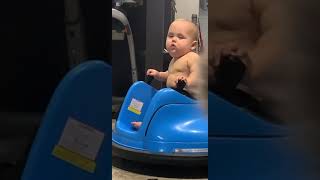 Toddler Tries Hard Not to Fall Asleep in His Bumper Car - 1152837