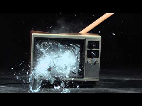 Royalty Free HD Slow Motion Smashing a TV with a Sledge Hammer