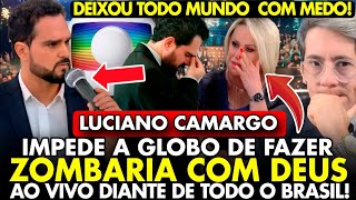 VERGONHA! LUCIANO CAMARGO IMPEDE a GLOBO de FAZER ZOMBARIA de DEUS AO VIVO DIANTE do BRASIL INTEIRO!