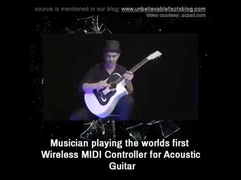 Musician  playing the  worlds first wireless midi controller   for acoustic  guitar