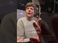 Louis Tomlinson taking to a fan after the show who had the Samsung phone he promoted on his Ig post