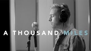 Musik-Video-Miniaturansicht zu A Thousand Miles Songtext von Jonah Baker