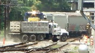 preview picture of video 'CSX Train & Dump Truck Near Miss???'