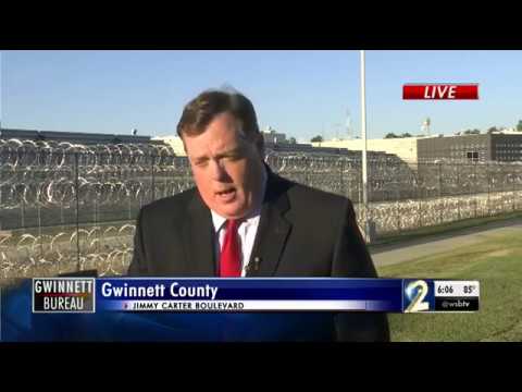 Woman accused of shooting at SWAT team trying to raid house