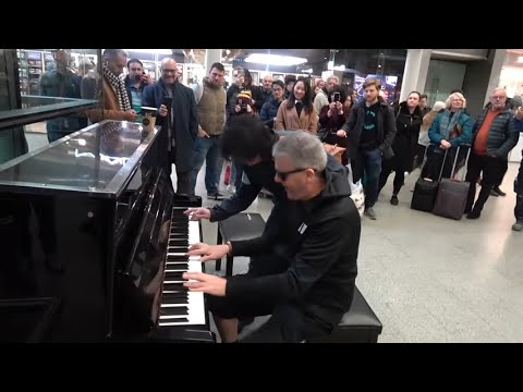 Epic Piano Battle Brings Crowd To A Standstill