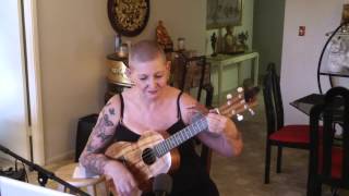 Ukelele played with Ku U Wehi O Ke Aumoe