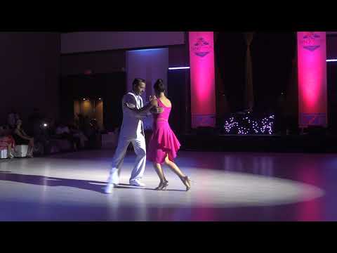 Luciano Brigante and Alejandra Orozco are dancing to the tango " Pata Ancha " by Osvaldo Pugliese at Tango Maya Festival