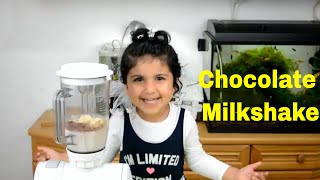 Chocolate milkshake by a little girl