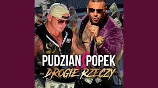 Kadr z teledysku Drogie rzeczy tekst piosenki Pudzian & Popek