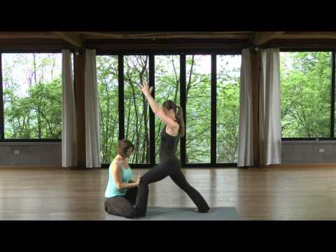 Hands-On Adjustments in Warrior One Pose