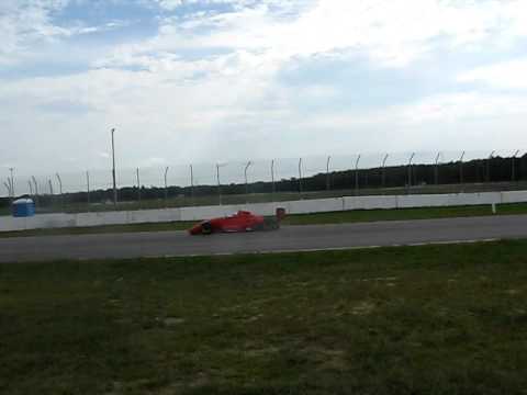Mike Rounds in Van Diemen RF97 legging it out on a Lotus Esprit