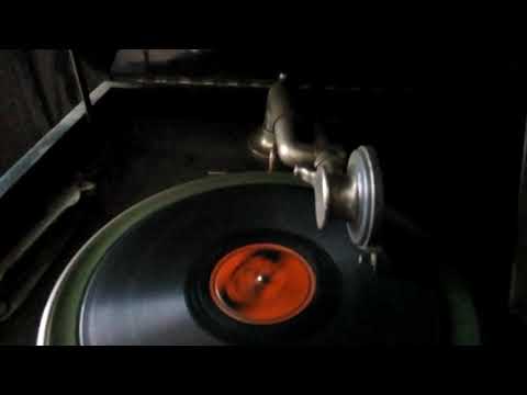 Old 78 on wind-up Record player.