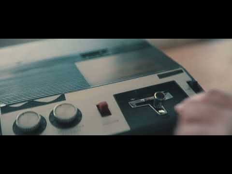 4K Man closing a tape in a cassette player and pressing play | Free Stock Video Footage