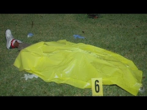 Jury sees images of Trayvon Martin's body