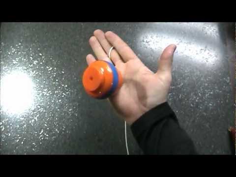 How to balance a spin top in your hand