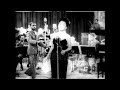 Lena Horne sings "That Man I Love" in front of band that Private Wallace conducts