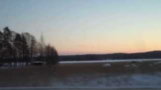 preview picture of video 'FAST DRIVE ON THE HIGHWAY AT SUNSET  IN WINTER ICE & SNOW OVER THE BRIDGE BY THE LAKE & COTTAGES'
