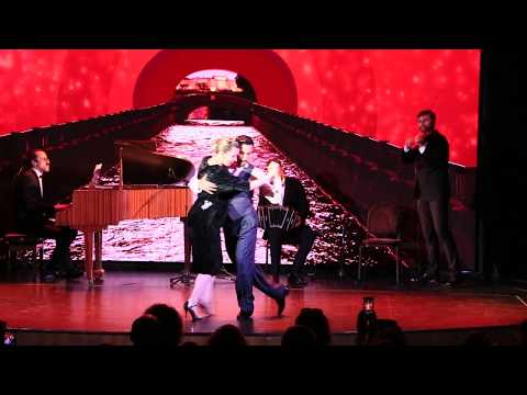  Carla Rossi  and  Jose Luis Salvo  are  dancing  to  a  milonga  at  White Nights tango festival  in  2018