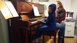 Tank at piano lessons, song title is stay