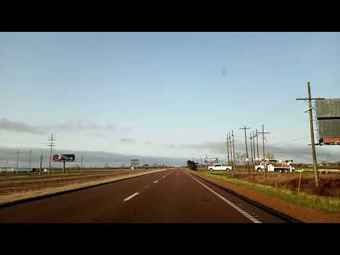 Driving on Hwy 61 South Mississippi Blues Highway Past a Nice Looking Water Tower on a Spring Day