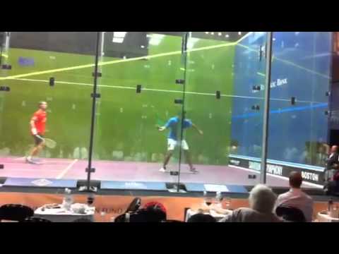 ramy ashour hits with his racket handle.MOV