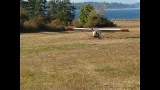 preview picture of video 'Denman Island, BC...Lone Pine farm...small airplane landing behind the house'