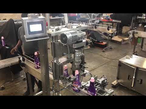 TM Engineering capping and closure handling machine