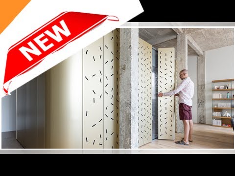 Sabo project drops an aluminum island in a raw parisian loft