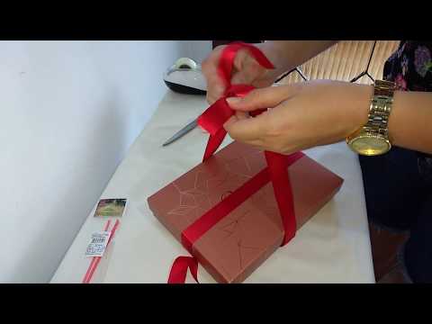 How to make a bow on the gift box itself with satin ribbon