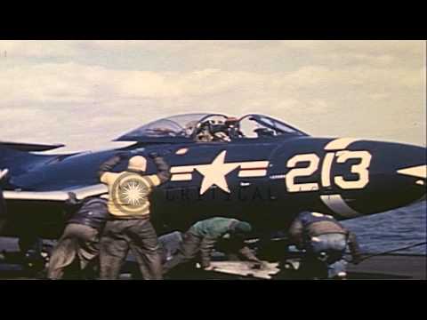 US Navy jet fighter aircraft F2H Banshee and F9F Panther on flight deck of USS Ph...HD Stock Footage