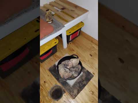 Heating a shed with hot rocks