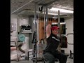 One-Arm Overhead Triceps Press 35kg for reps