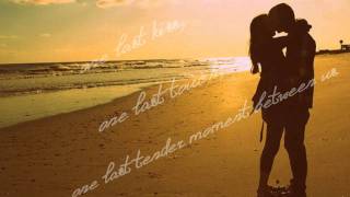 _One last kiss,one last touch, one last tender moment between us lyrics