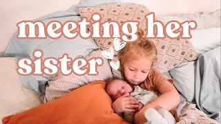 Our toddler meets her newborn baby sister (Adorable reaction!)