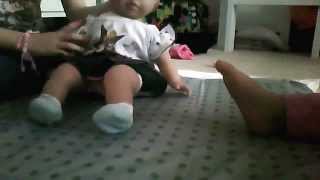 Feeding and changing Beth - By Maisie and Bethany