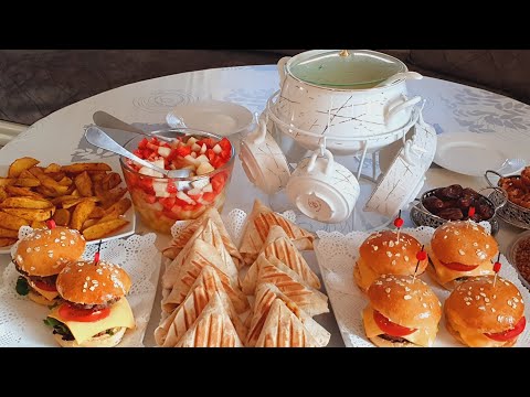 Homemade burgers, chicken triangles, oven potatoes, zucchini velouté and fruit salad