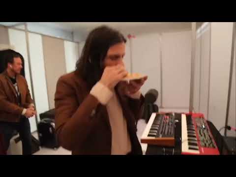 brian bell of weezer chokes on a piece of toast