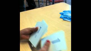 First Graders Playing &quot;Tens Go Fish&quot;