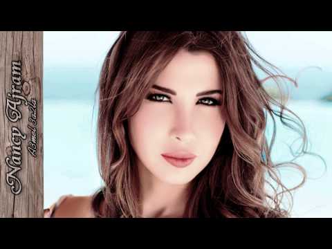 Nancy Ajram - A3mel 3a2la + EN Lyrics