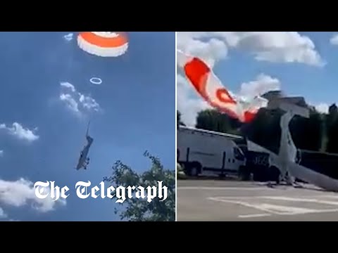 Pilot deploys parachute to slow the descent of his light aircraft as it crashes