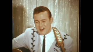 Warner Mack Sitting on a Rock Crying in a Creek