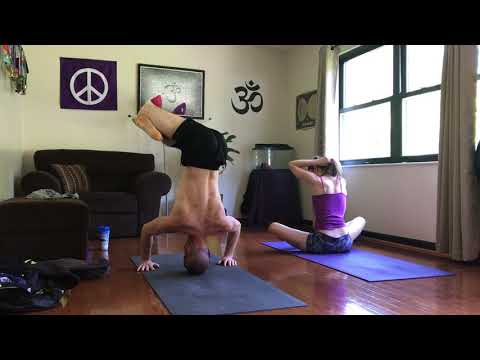 Yoga  lotus arm balance transitions from headstand