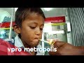 A 9 year old chain smoker from Indonesia - vpro Metropolis